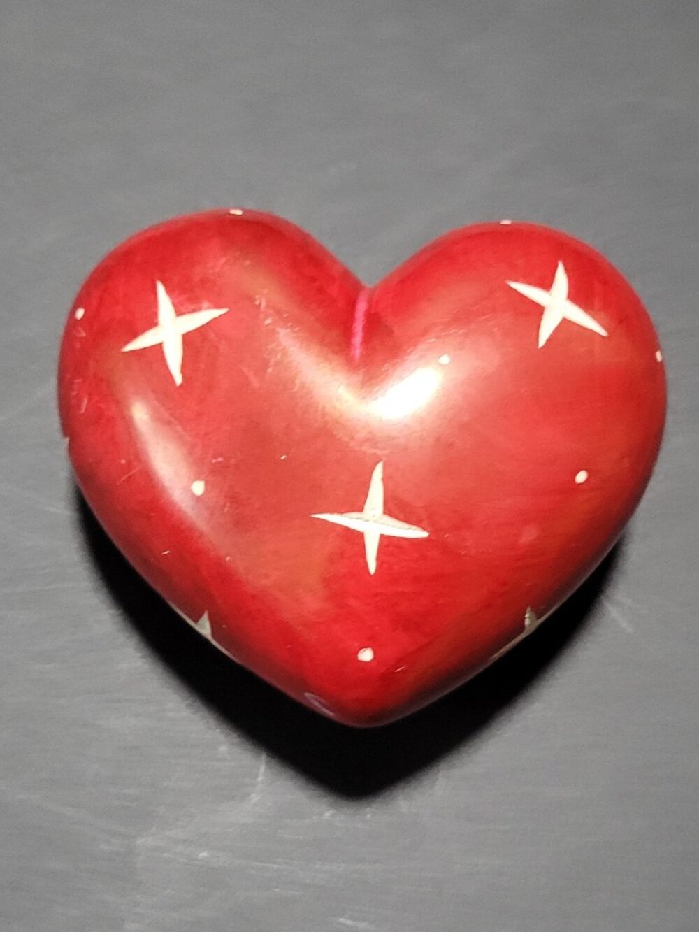 Hand-carved stone heart decoration